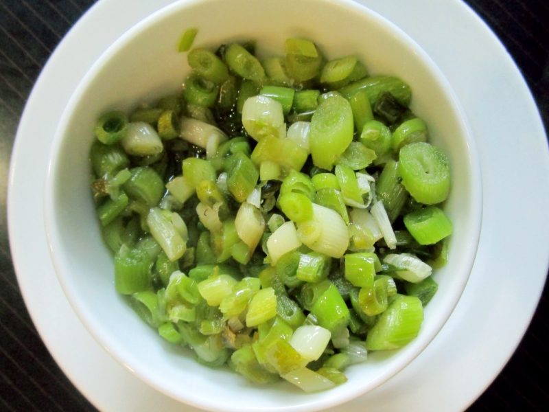 Green garlic, chopped and sweated in olive oil, has a mild and sweet flavour.