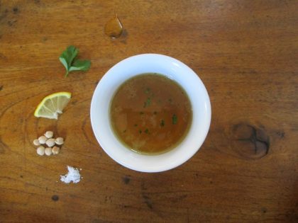 Chickpea broth seasoned with lemon and parsley and, if you like, a little olive oil.