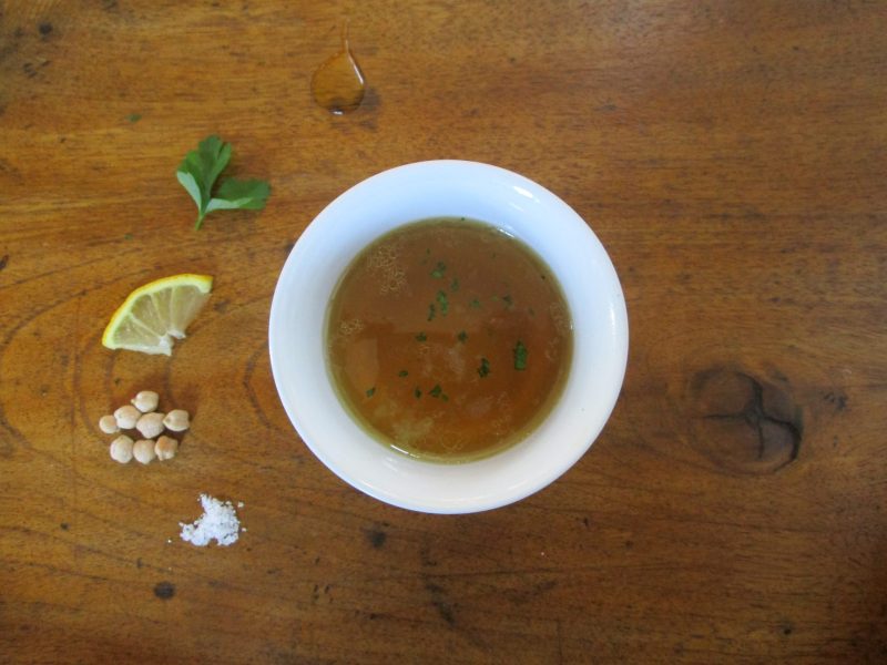 Chickpea broth seasoned with lemon and parsley and, if you like, a little olive oil.