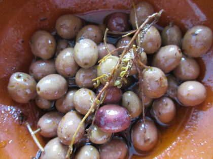 Green table olives marinated here with fennel, bay, thyme, orange zest and garlic.