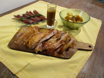 Roast turkey, sweet-and-sour-lemon sauce, chunked fried potatoes and bundled red chard.
