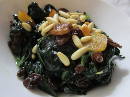Spinach macerated in olive oil aromatised with raisins and served with toasted pine kernels.